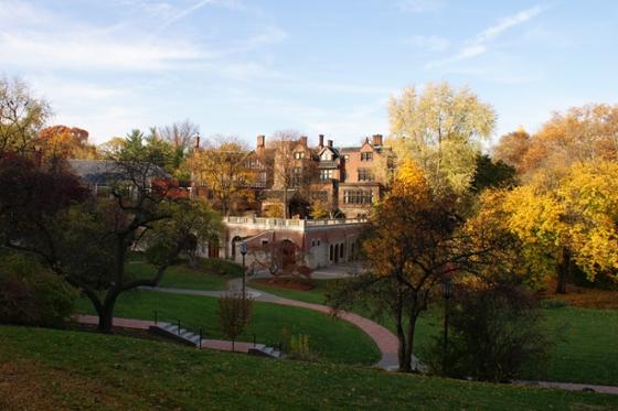 Rolling grassy hills, historic red brick buildings, and multicolored autumn trees decorate Chatham University's Shadyside campus in Pittsburgh. 